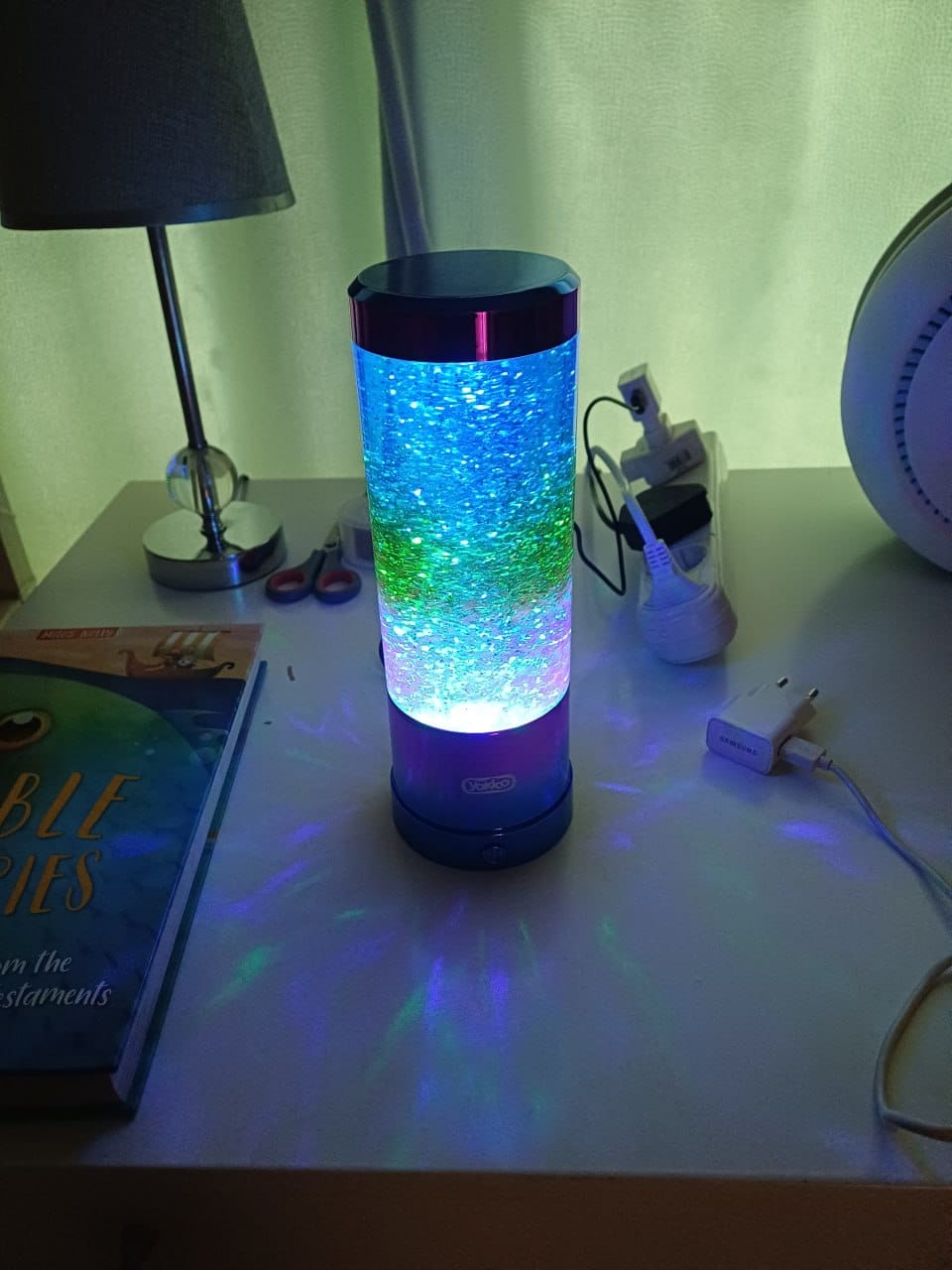 The finished lamp glowing in a dimly lit room