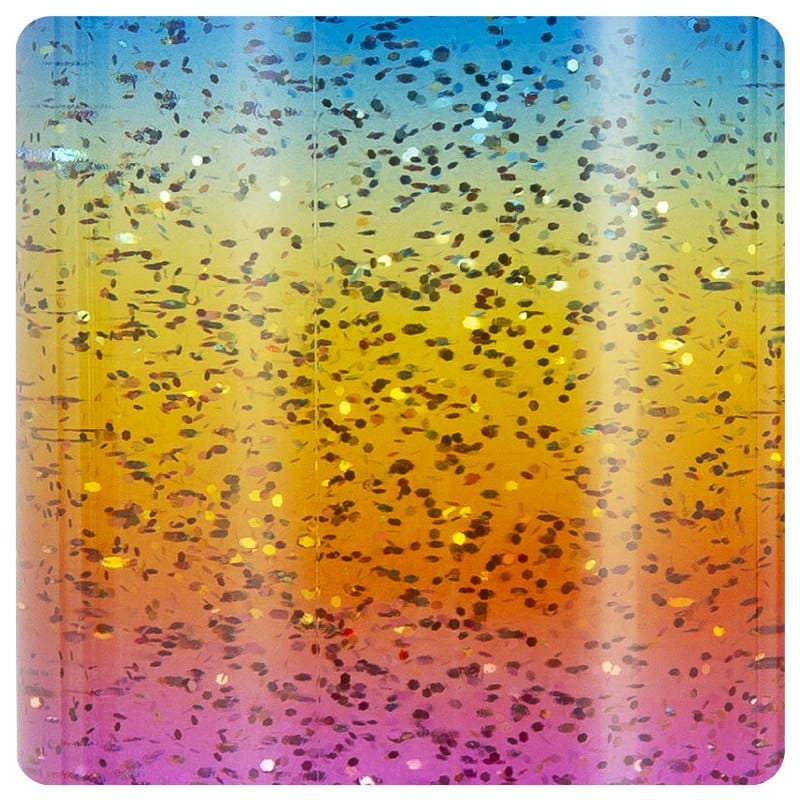 Close-up of glitter swirling through the coloured liquid inside the lamp